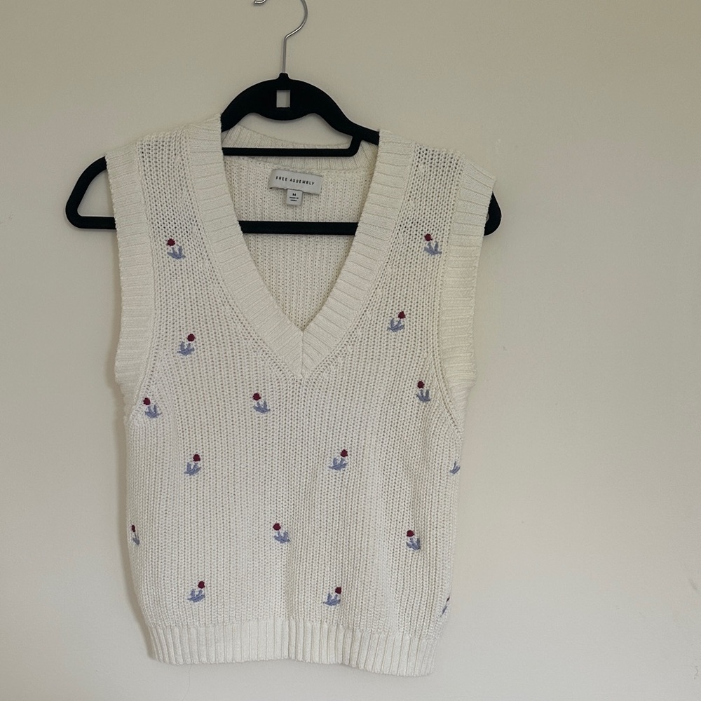 White V-Neck Sweater Vest with Embroidered Accents